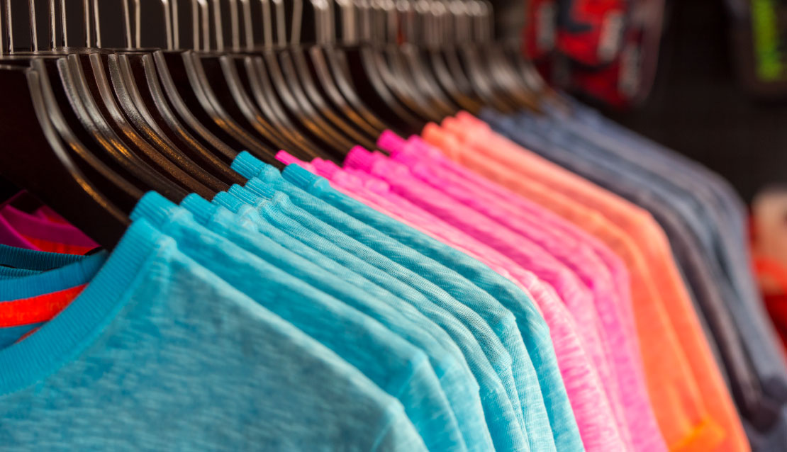 Colorful shirts on a rack